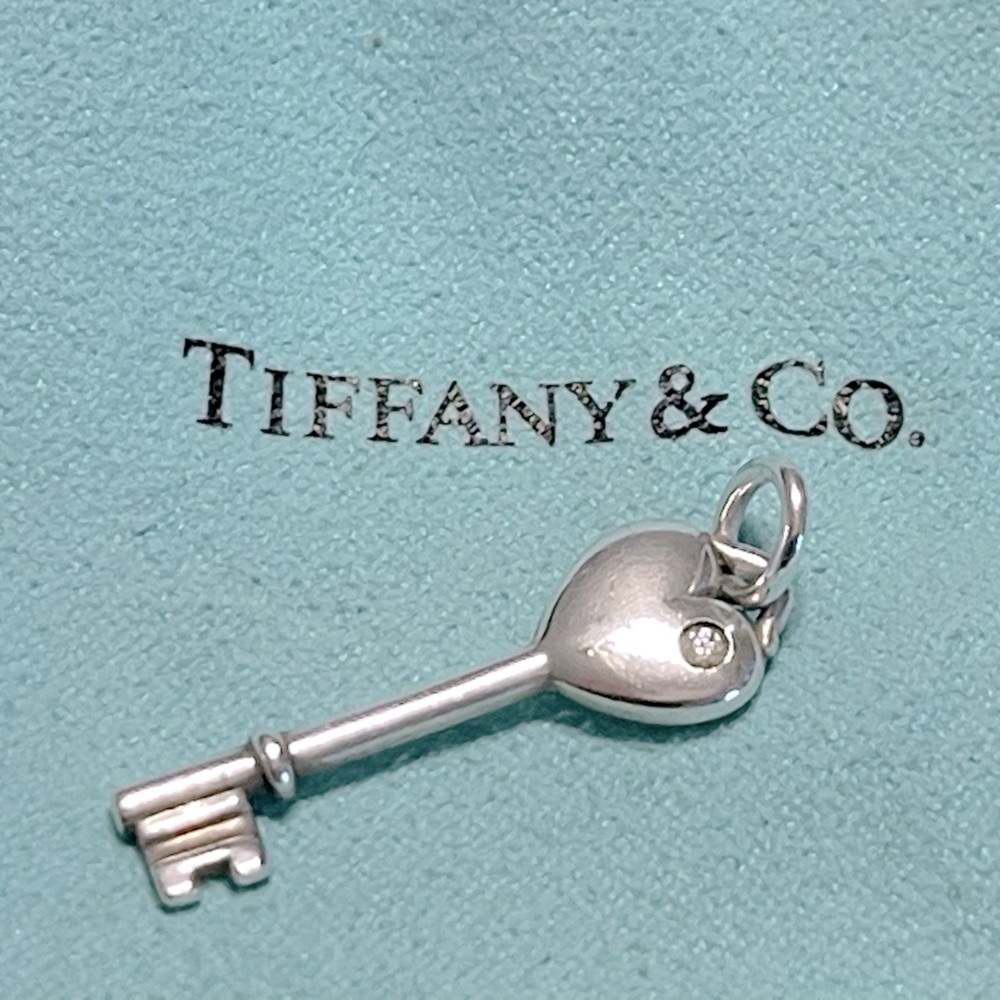 Tiffany & Co. Mini key with pouch (no chain) EUC